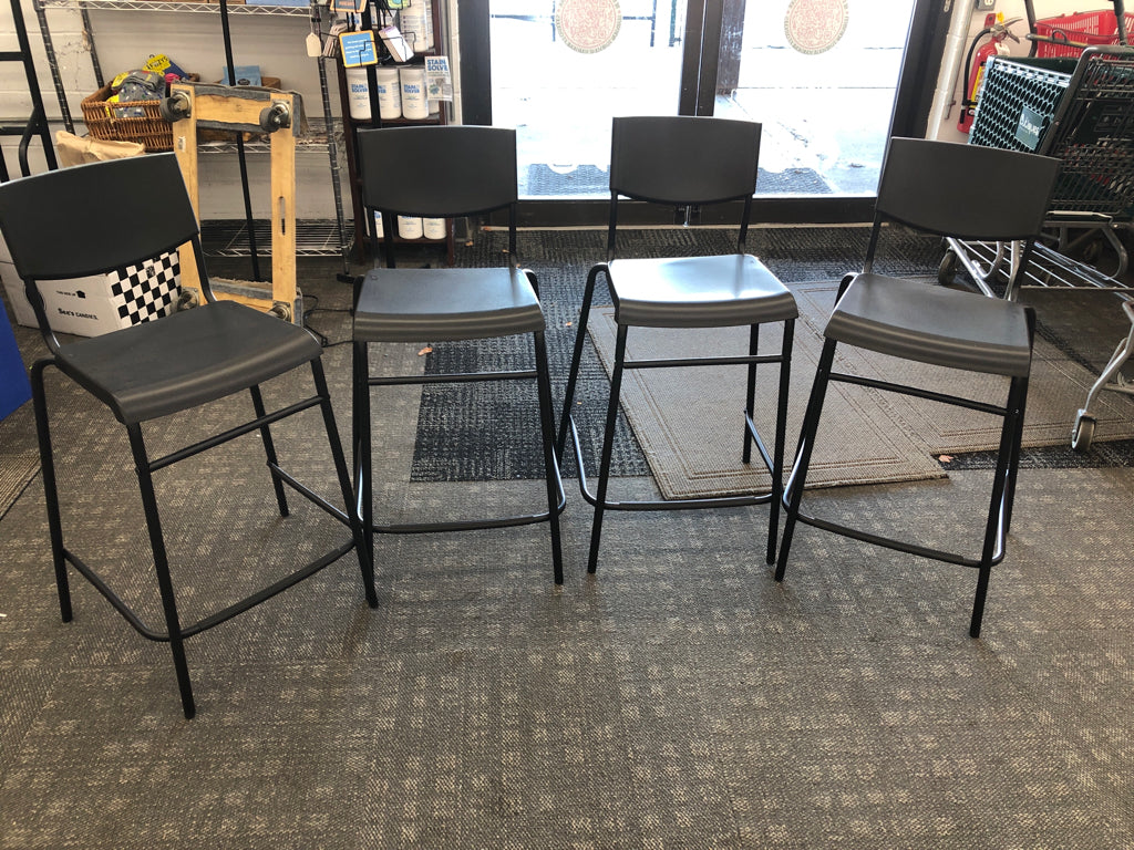 4 BLACK PLASTIC IKEA BAR STOOLS.