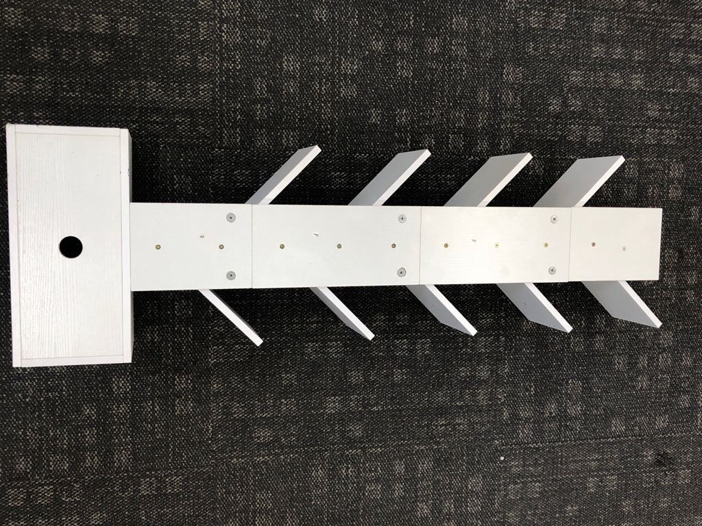 NARROW WHITE PLASTIC BOOK TREE.