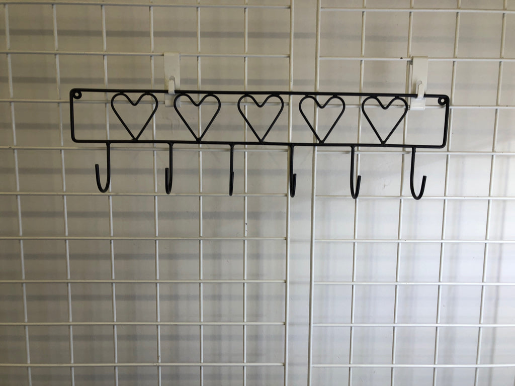 BLACK METAL 6 HOOK WALL HANGING.