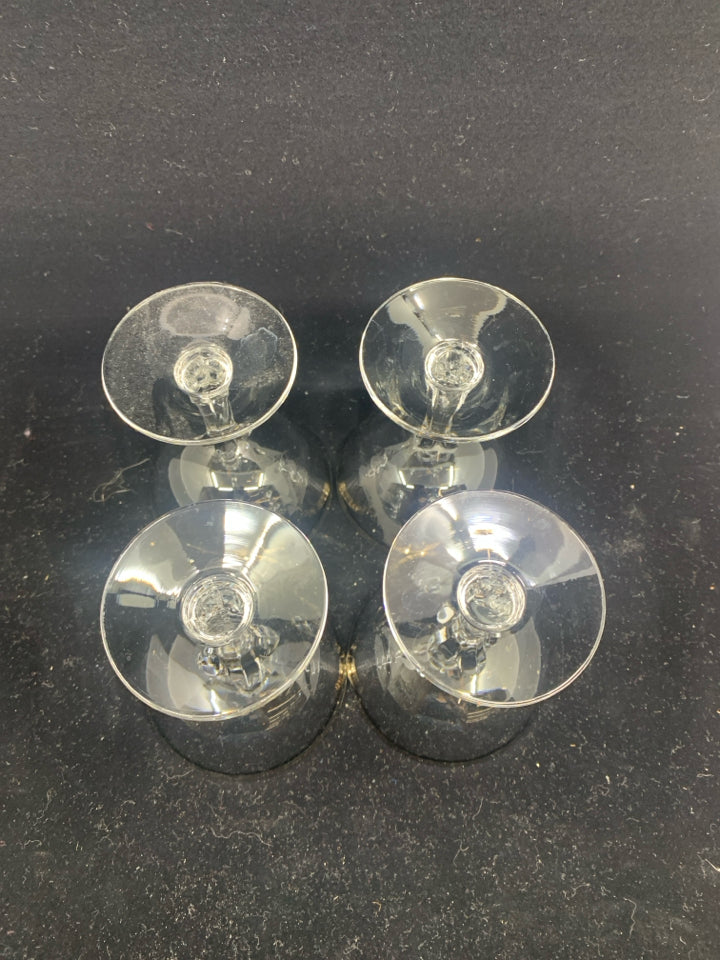 4 SMALL GLASSES W/ SILVER RIM.