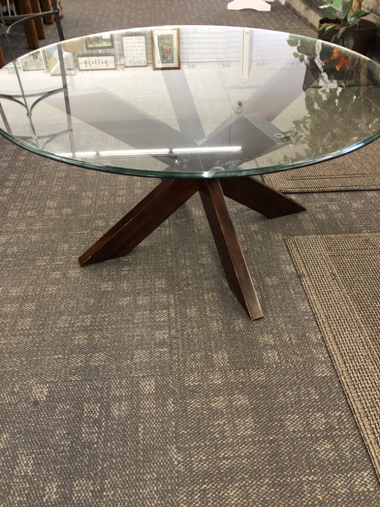 CIRCLE LOW GLASS COFFEE TABLE W/ DARK BASE.