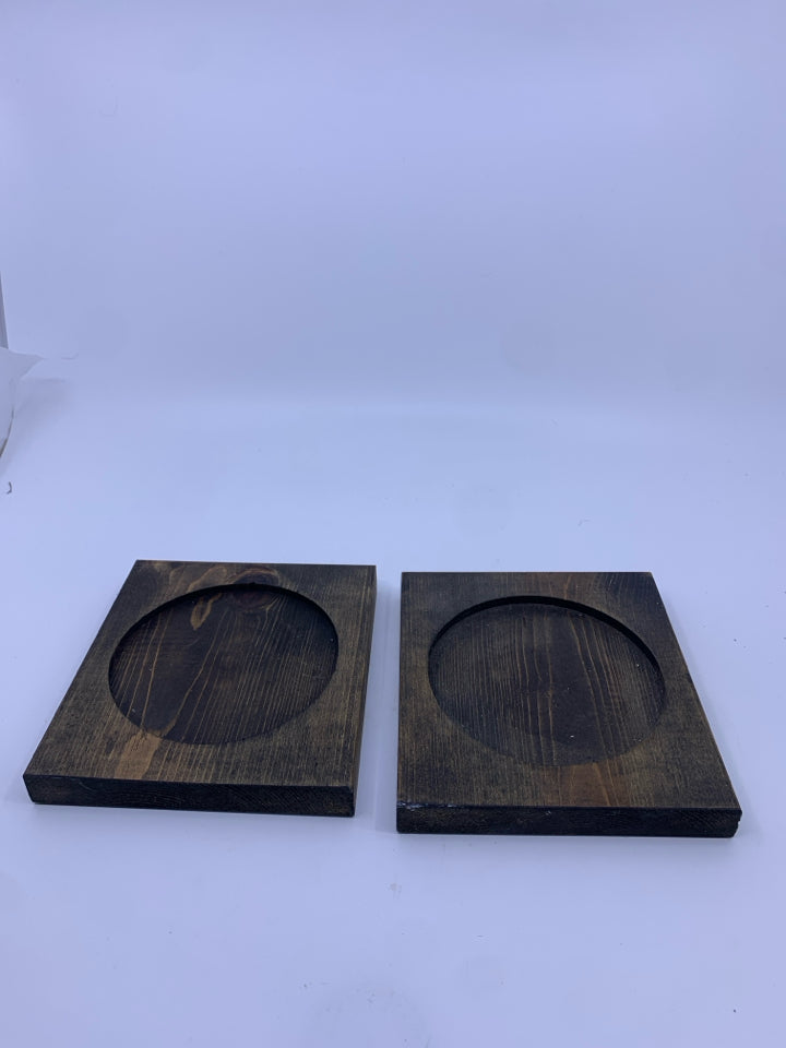 2 WOOD CANDLE PLATES.