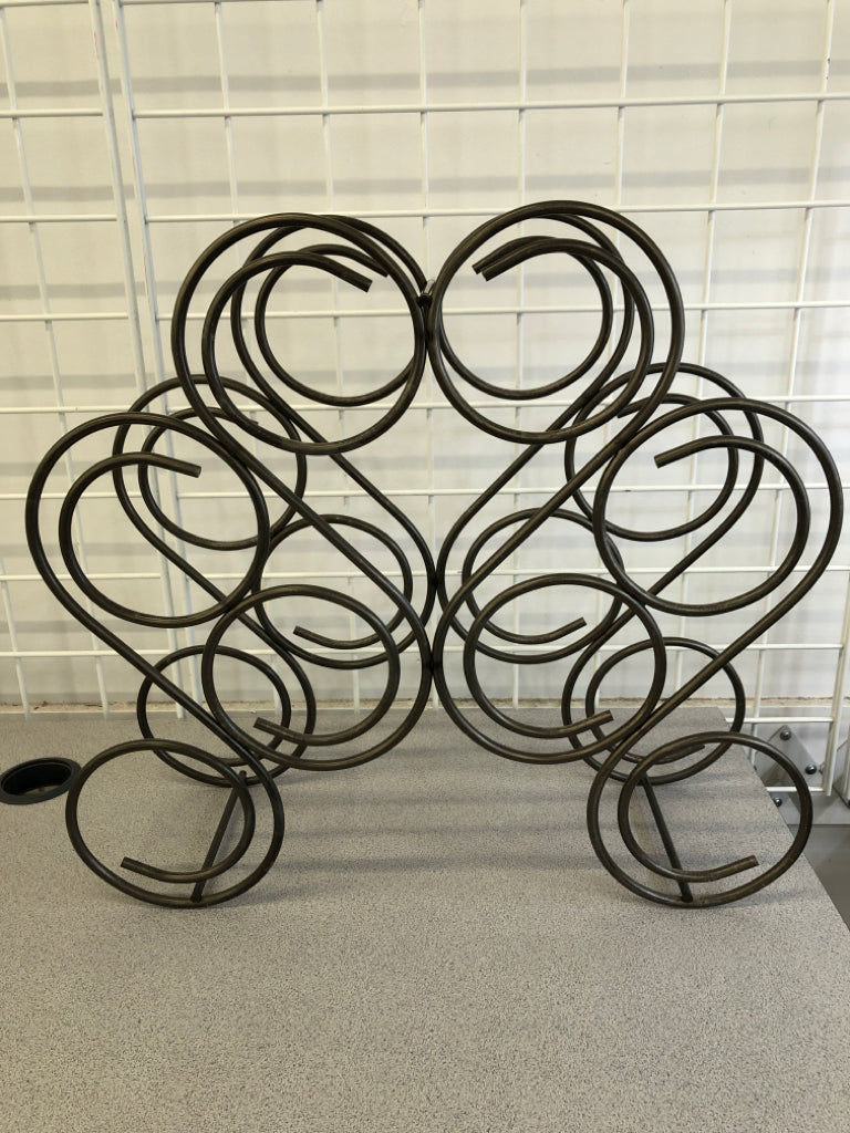 SILVER METAL SCROLL WINE RACK.