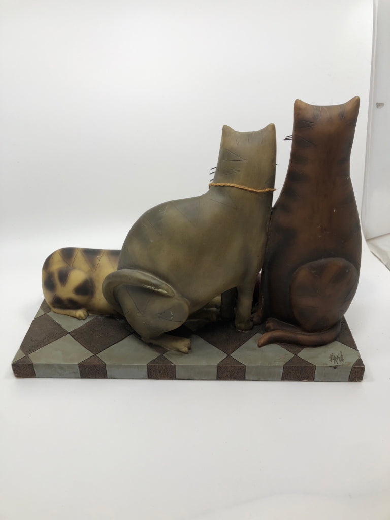 3 CATS ON CHECKERED BASE.