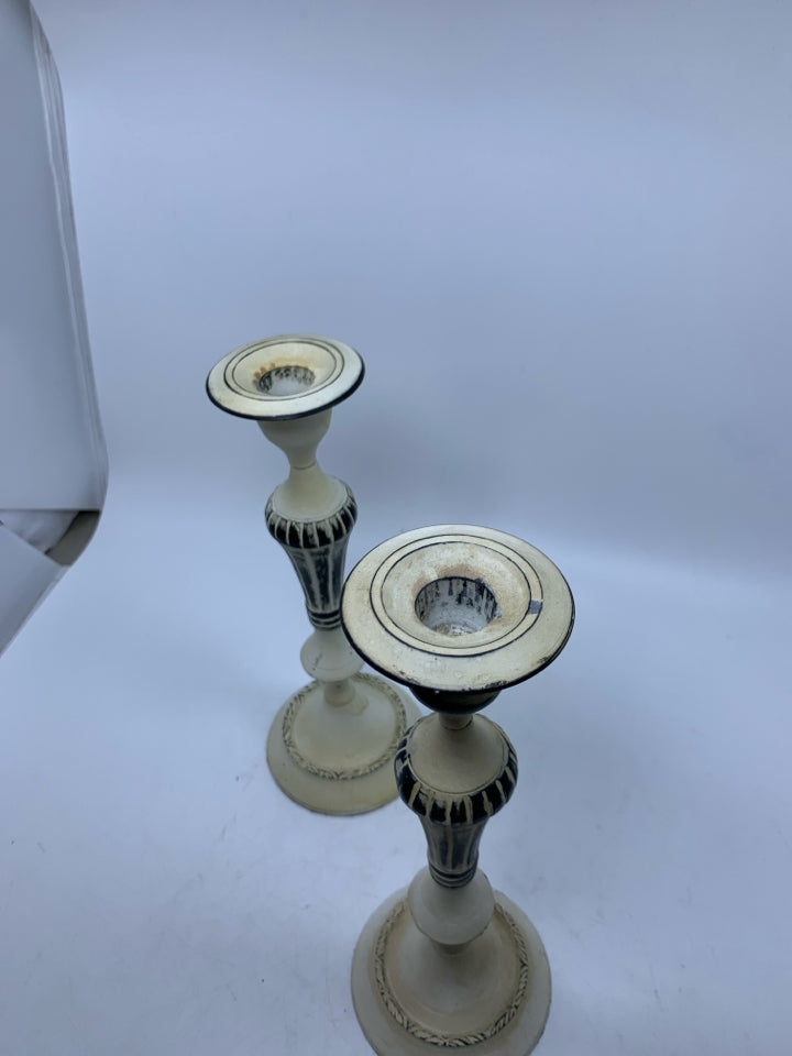 2 IVORY PAINTED METAL TAPER CANDLESTICKS.