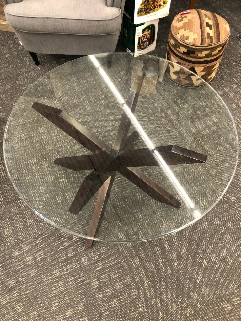 CIRCLE LOW GLASS COFFEE TABLE W/ DARK BASE.