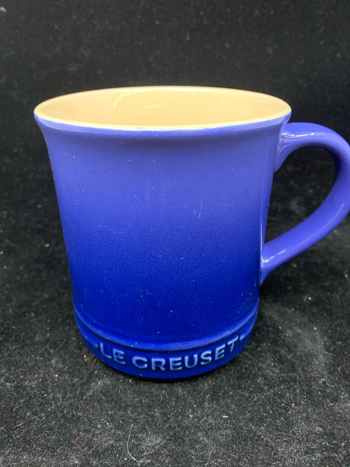 BLUE LE CREUSET MUG.