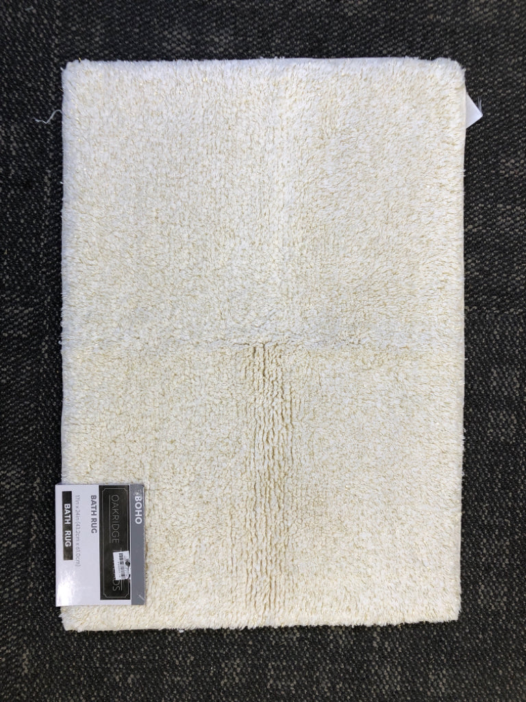 NIP CREAM BATH RUG.