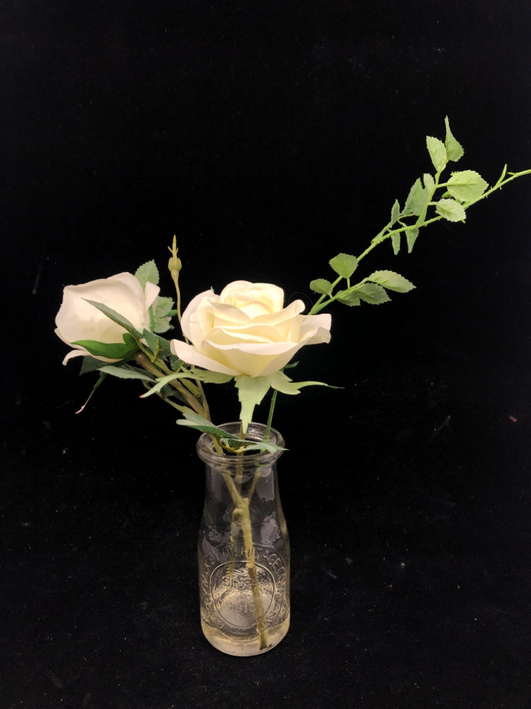 SMALL WHITE FAUX ROSES IN GLASS JAR.