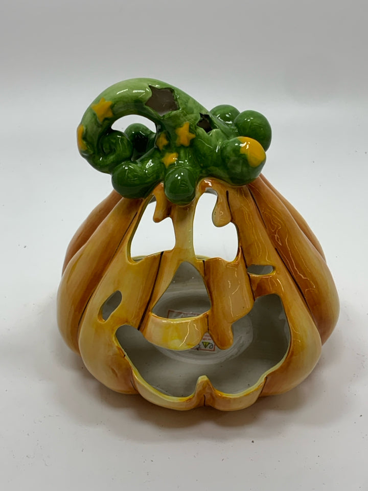 JACK O LANTERN CERAMIC TEALIGHT HOLDER.