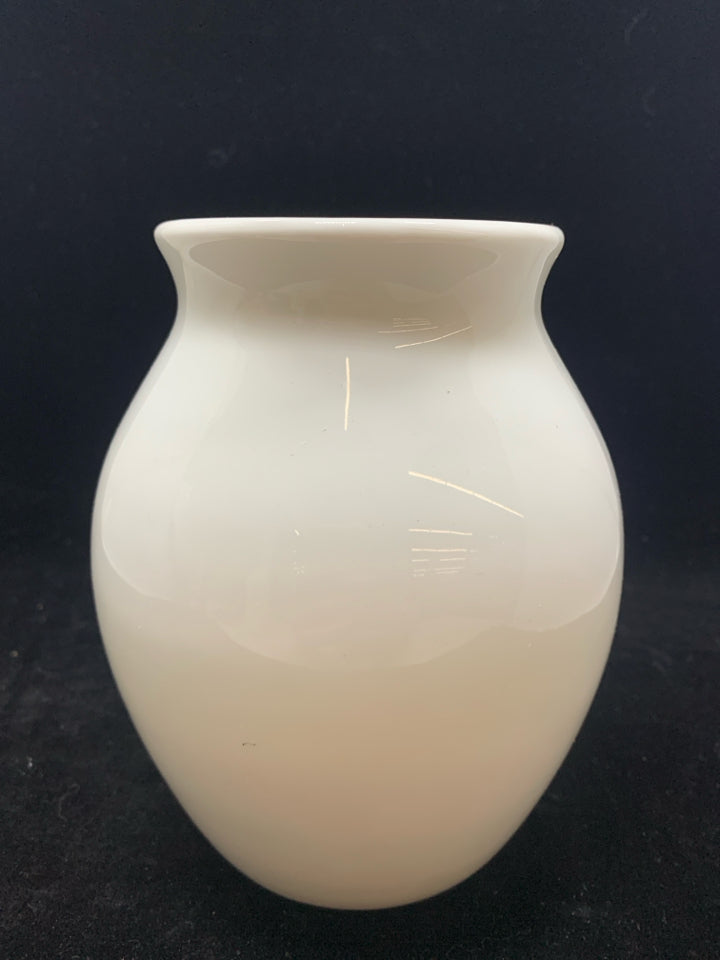 WHITE CERAMIC VASE.