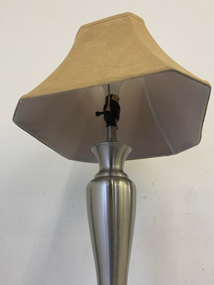 SILVER BASE LAMP W TAN SHADE.