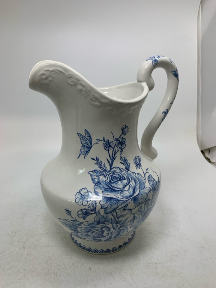 BLUE ROSES PATTERN PITCHER W/ EMBOSSED EDGE.