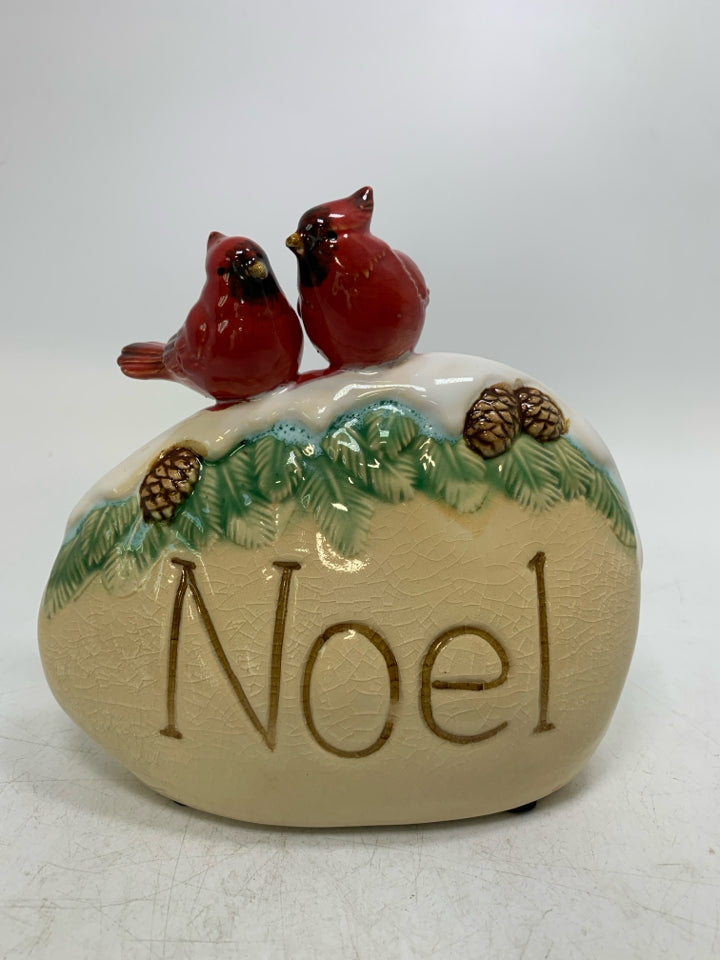 OVAL TAN NOEL ROCK W/ 2 CARDINALS.