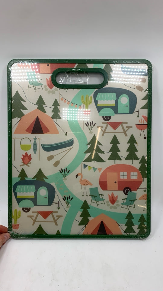 NIP CAMPER THEME CUTTING BOARD.