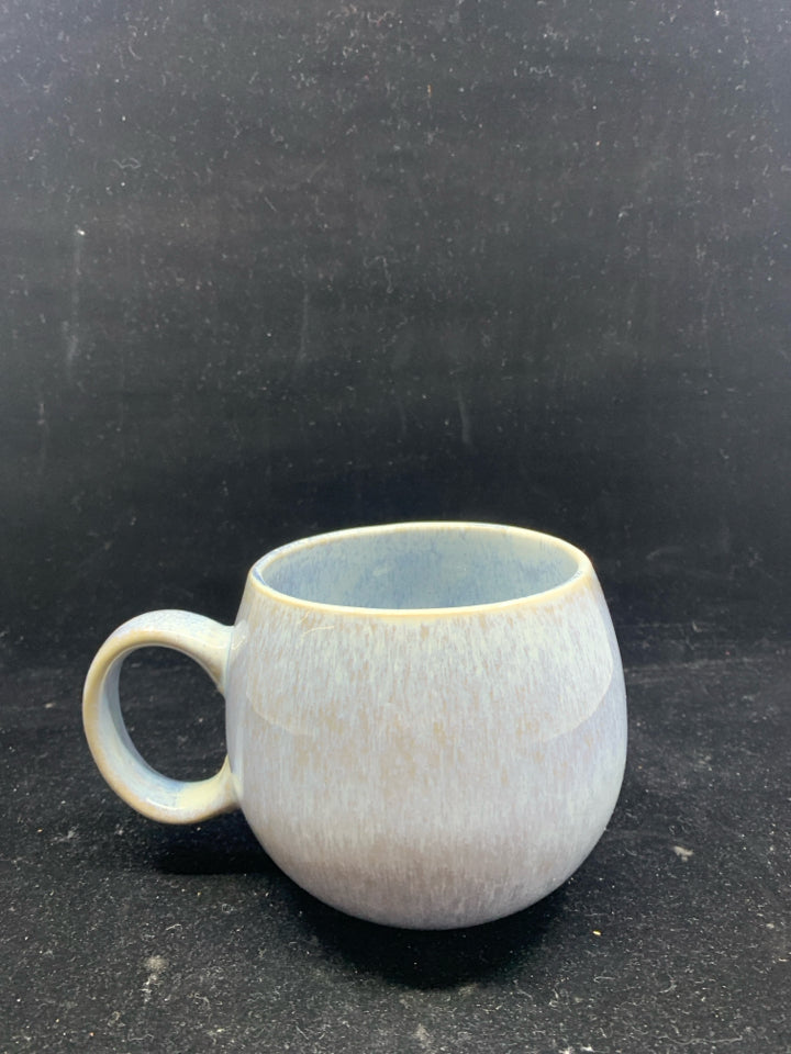 LIGHT BLUE POTTERY MUG.