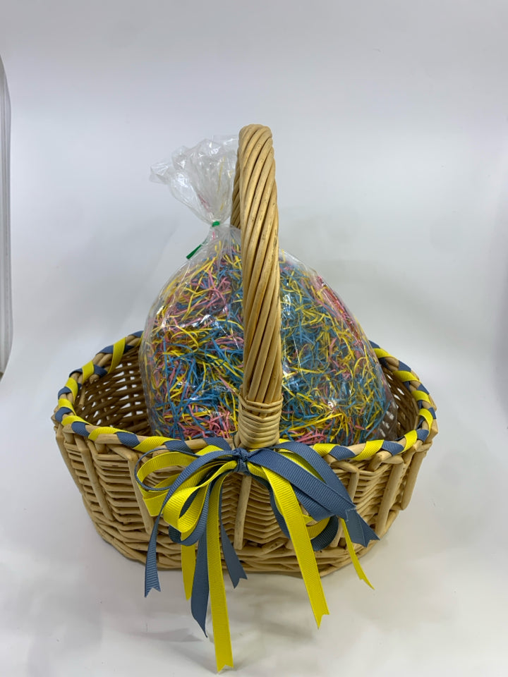 WOVEN EASTER BASKET W/BLUE AND YELLOW RIBBON FAUX GRASS.