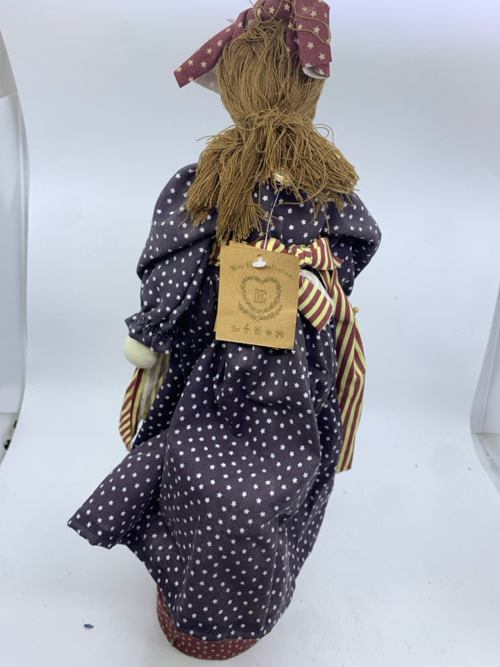PRIMITIVE AMERICANA DOLL WITH FLAG ON STAND.