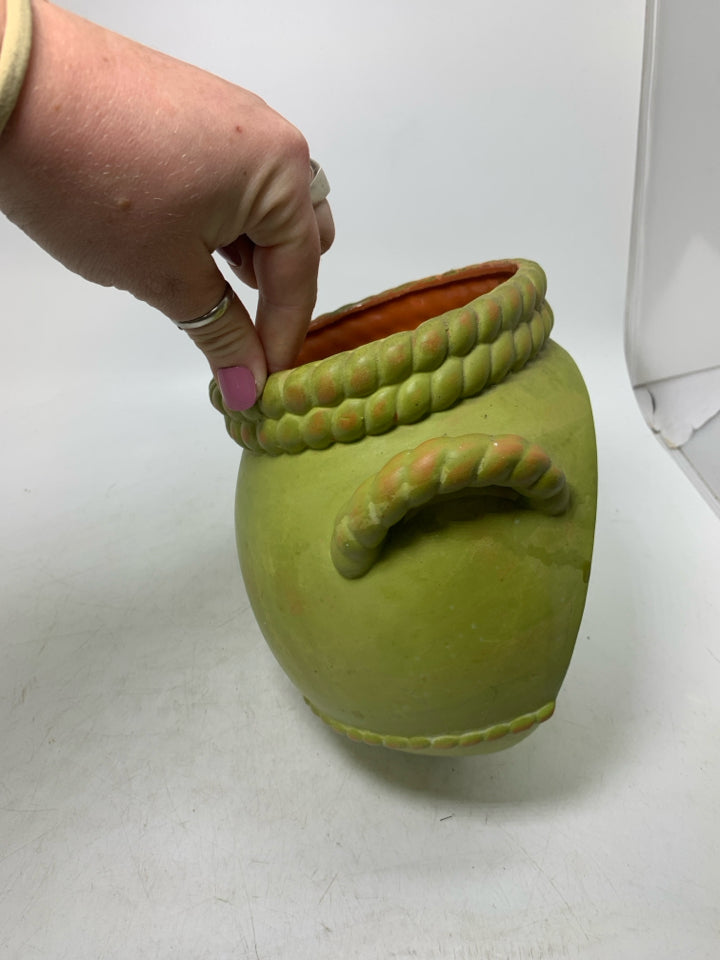 TERRA COTTA WALL VASE W/ BRAIDED HANDLES.
