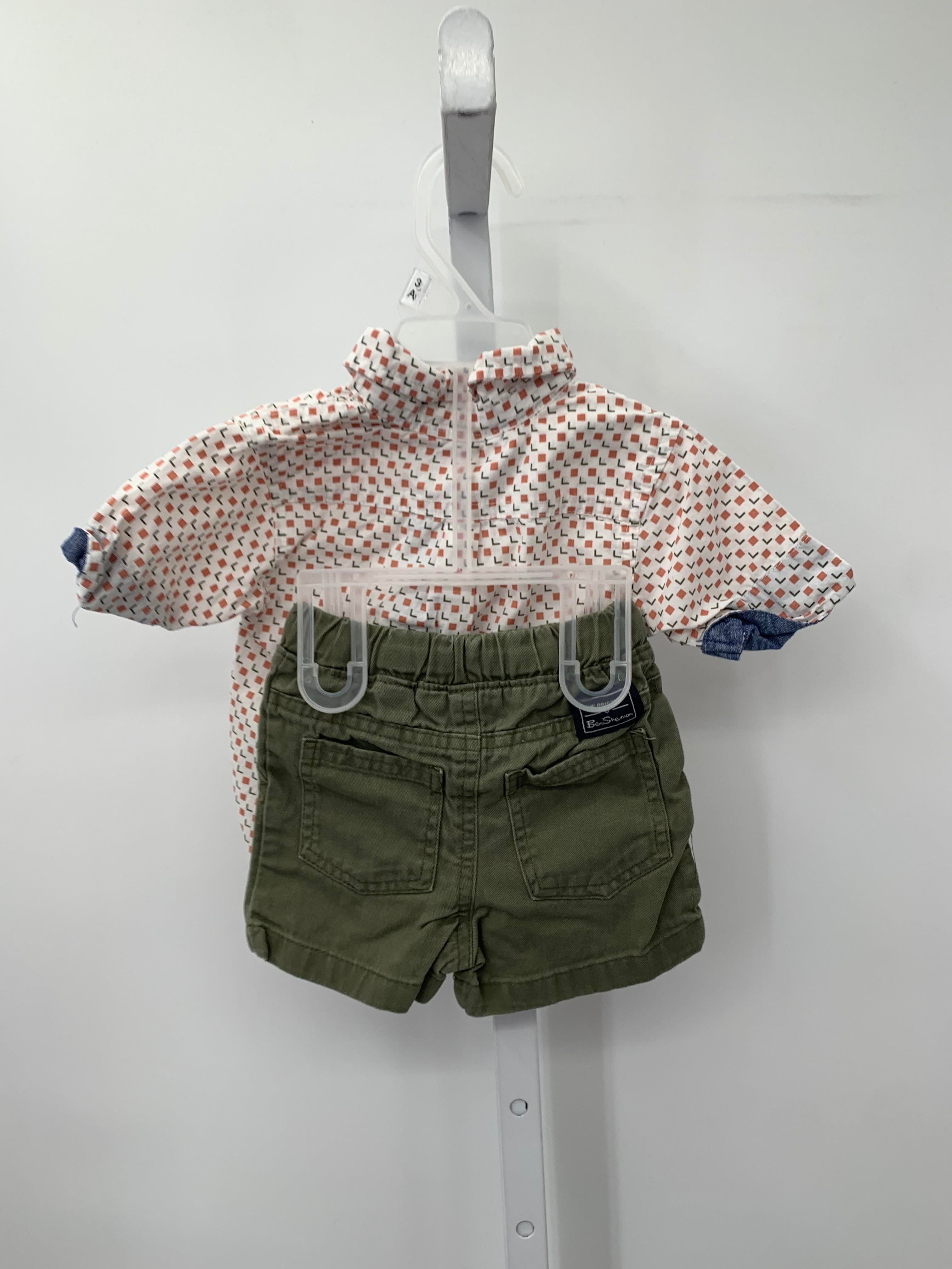 PATTERN BUTTON DOWN SHIRT AND GREEN SHORTS.