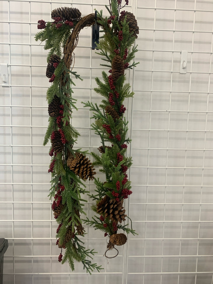PINECONES AND RED PIP BERRY GARLAND.