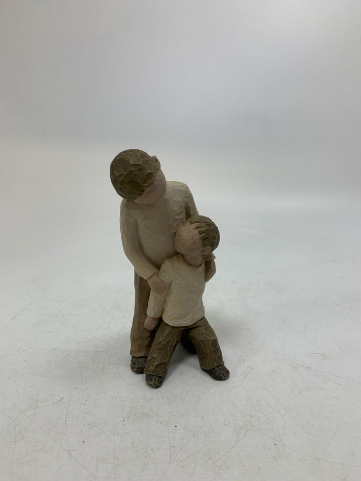 2 BROTHERS LEANING AGAINST EACHOTHER 2001.