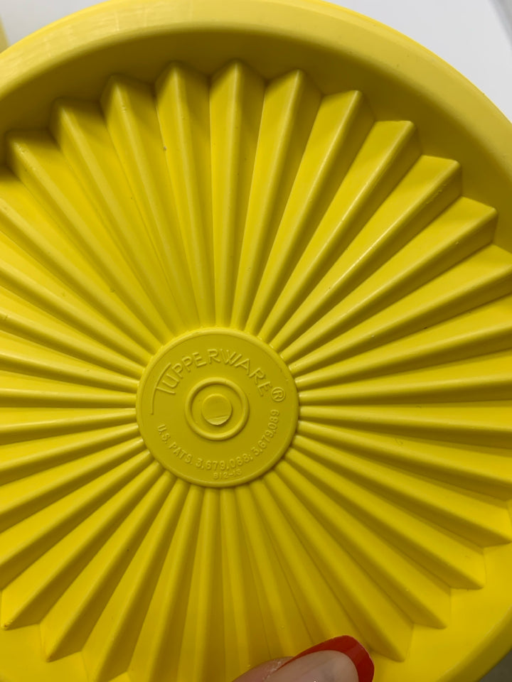 2 VTG NESTING YELLOW SERVALIER CANISTERS.