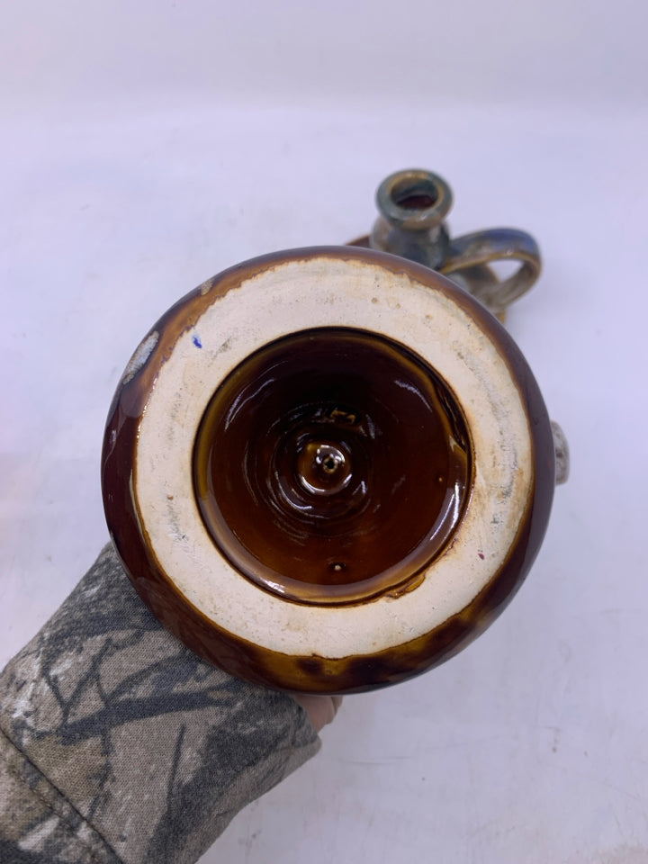 2 BROWN WHITE GREEN GLAZED TAPERED CANDLE HOLDERS W/ HANDLES.