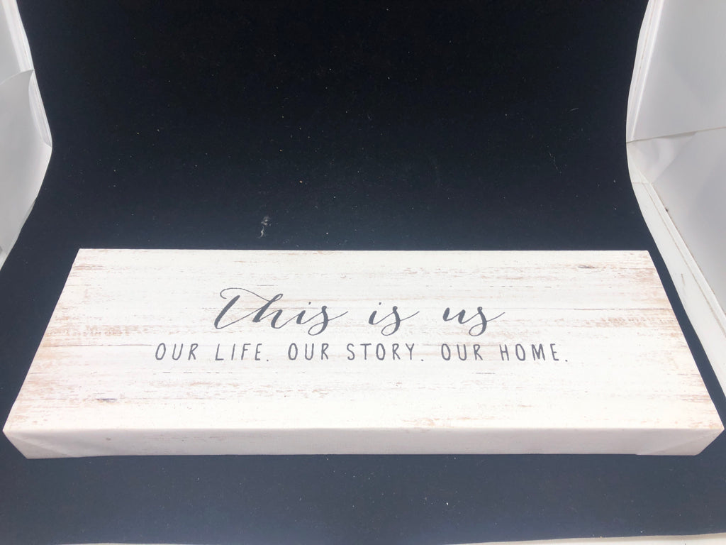 "THIS IS US" WHITE CANVAS WALL HANGING.