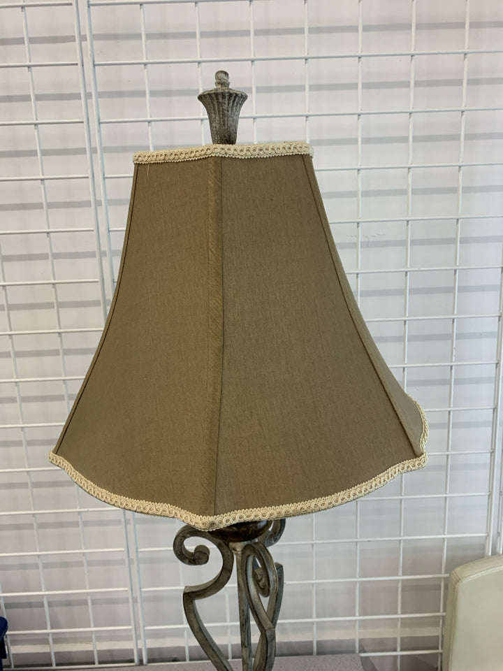SILVER SCROLL BASE LAMP W/BROWN EMBROIDERED EDGE SHADE.