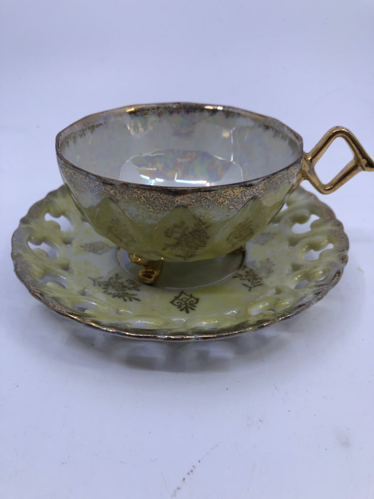 VTG PALE YELLOW W GOLD ACCENTS AND LACE PATTERN TEACUP AND SAUCER.