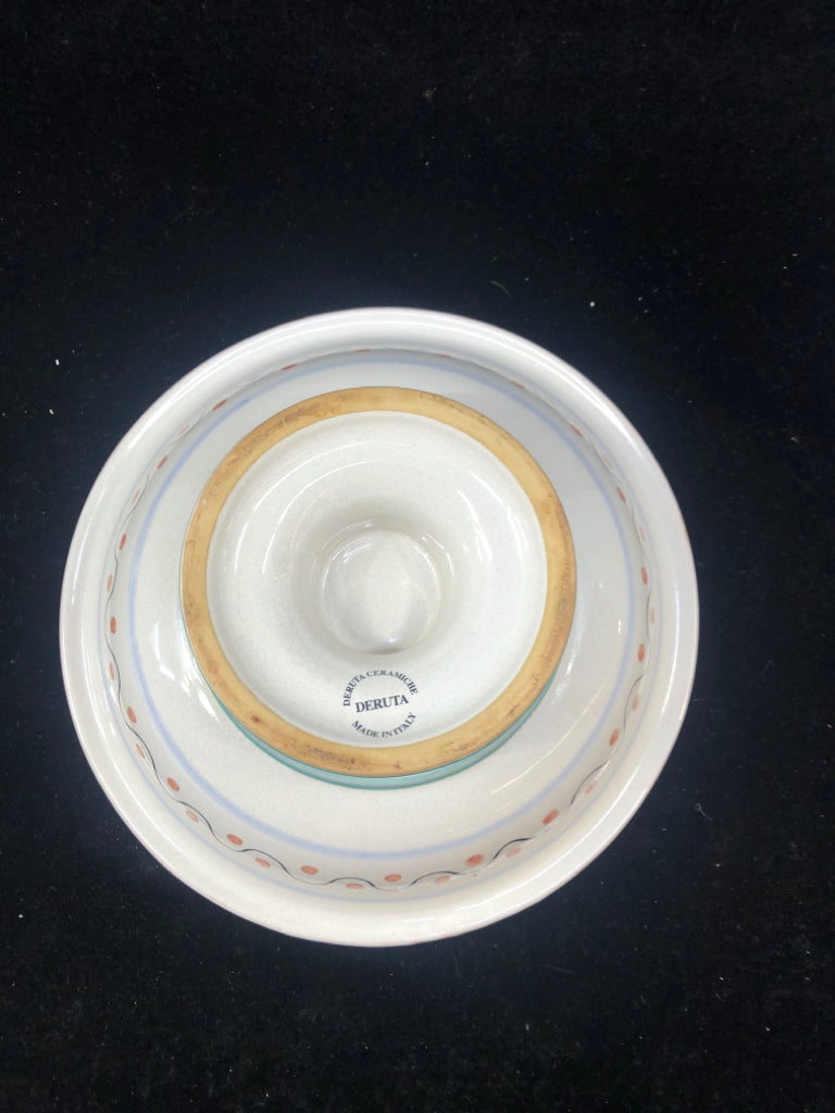 FOOTED BLUE AND YELLOW PATTERN BOWL.