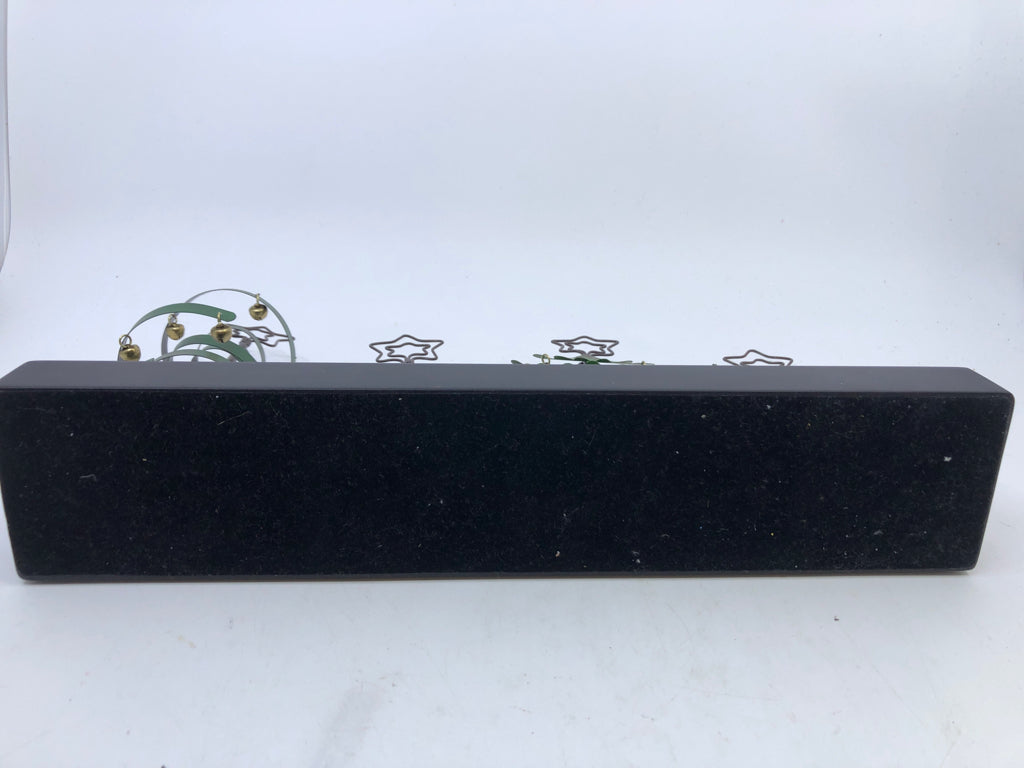 METAL CHRISTMAS TREES ON STAND W BELLS.