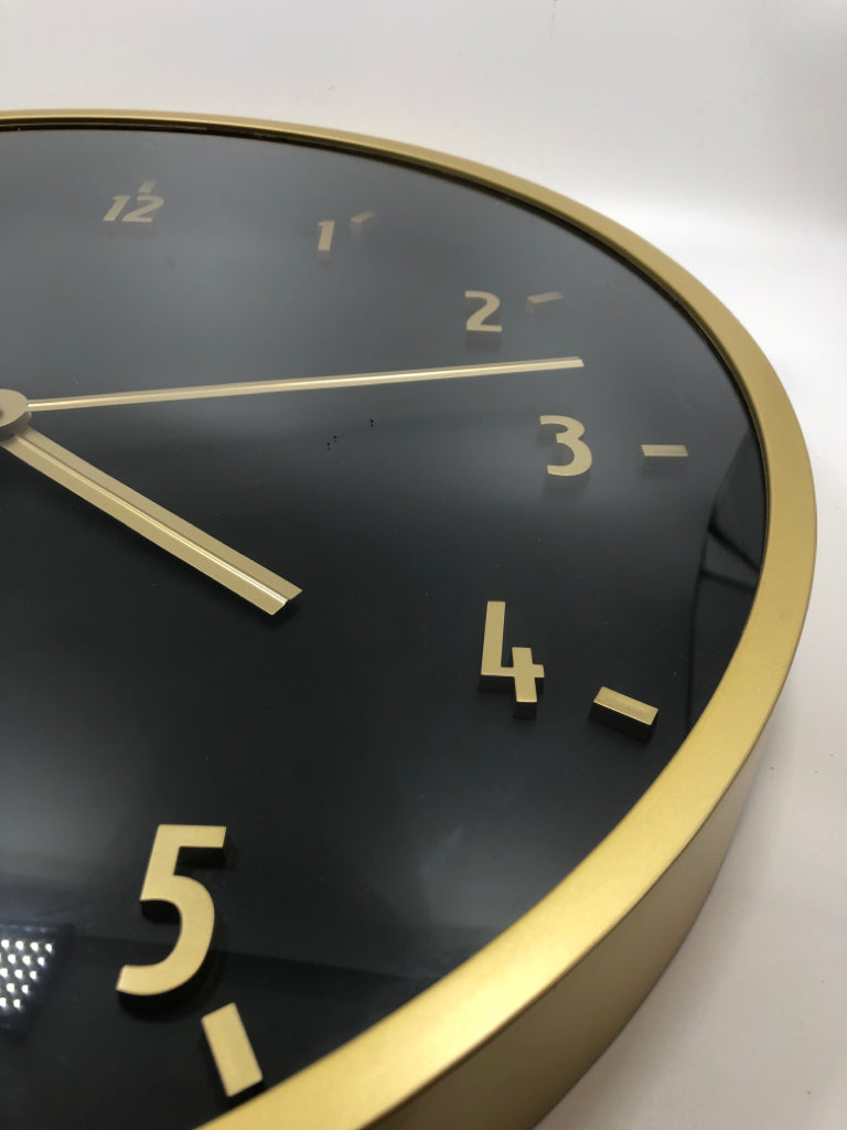 LARGE BLACK/GOLD WALL CLOCK.