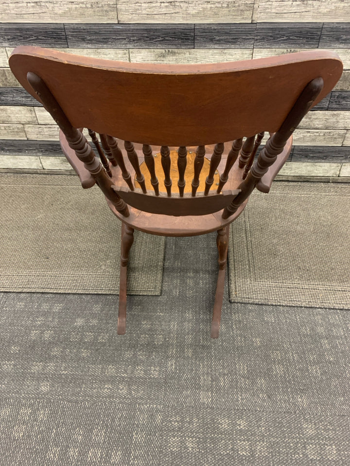 VTG DARK WOOD RAM CARVED ROCKING CHAIR.