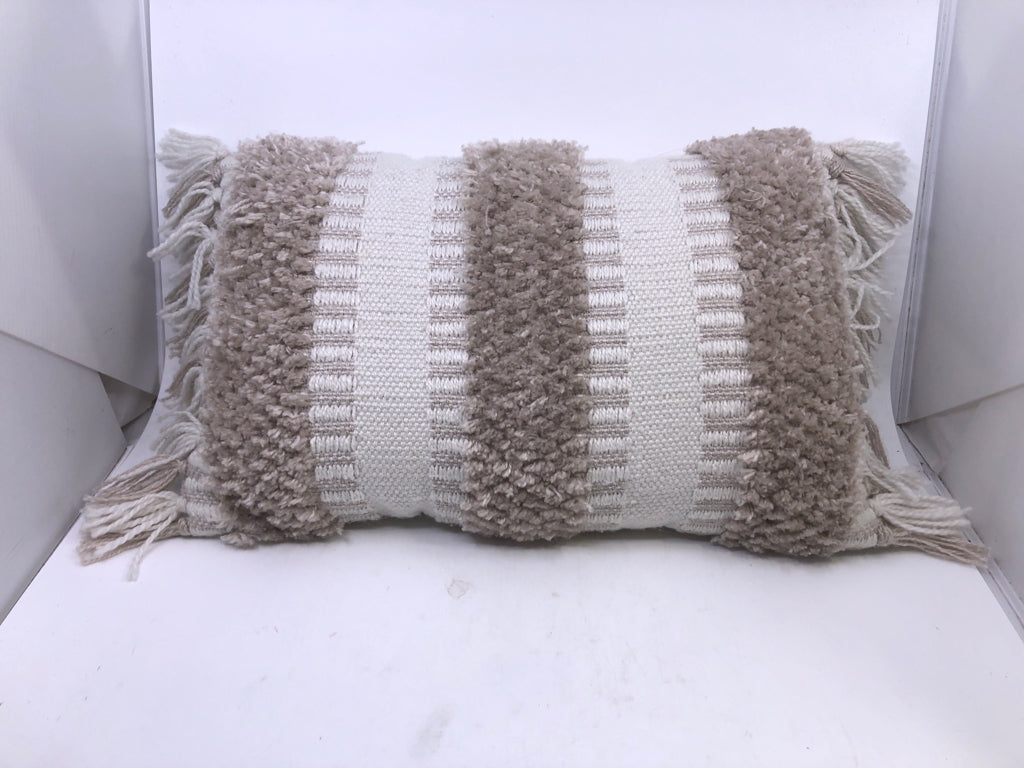 RECTANGLE TAN AND CREAM PILLOW W/FRINGE.