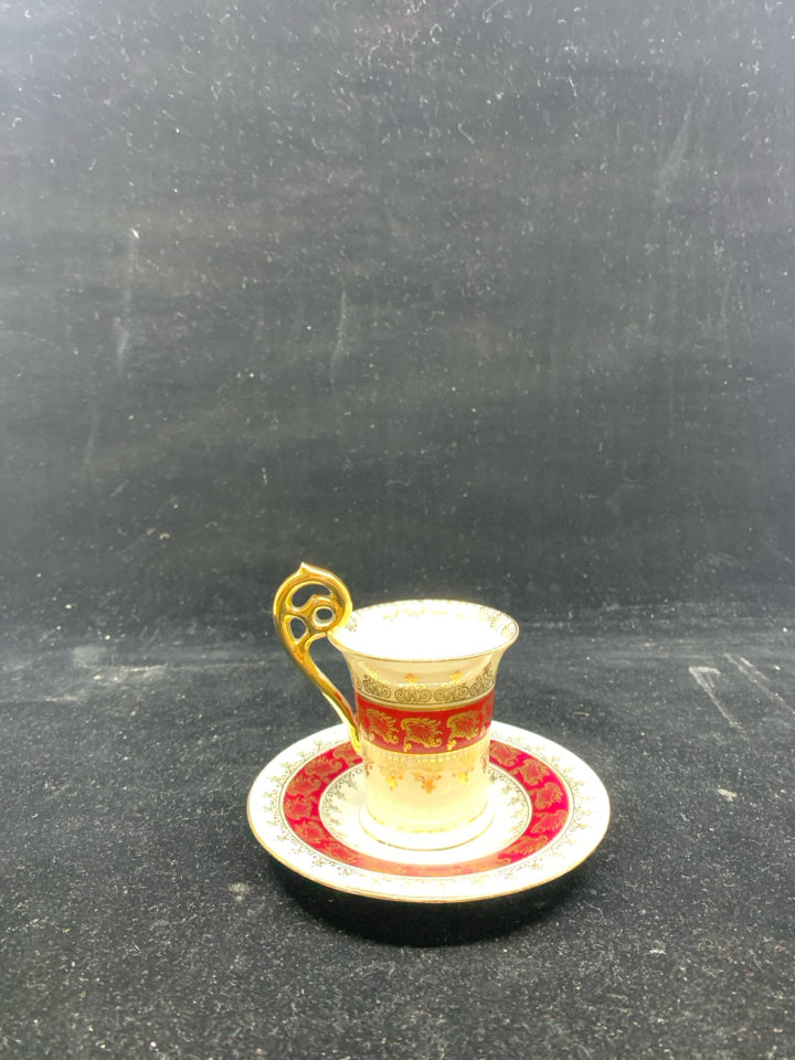 VTG DEMITASSE TEA CUP + SAUCER MAROON W/ GOLD DESIGNS.