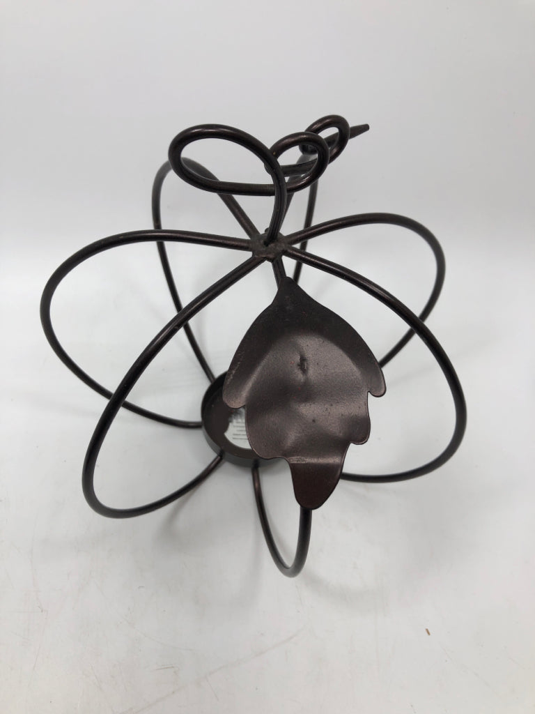BROWN METAL PUMPKIN CANDLE HOLDER.