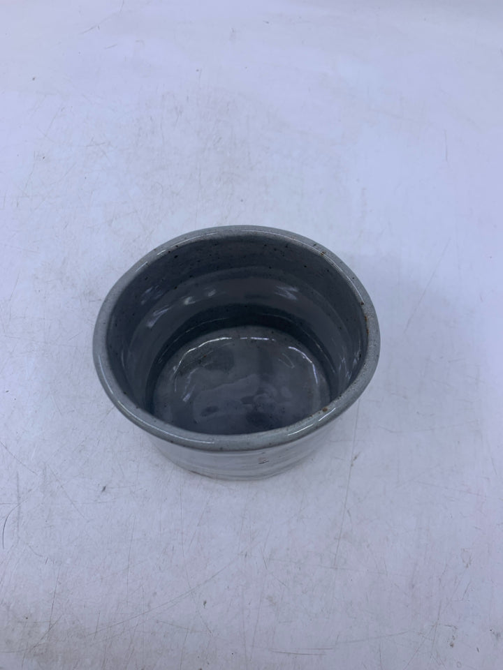 LIGHT GREY OVAL POTTERY VASE.