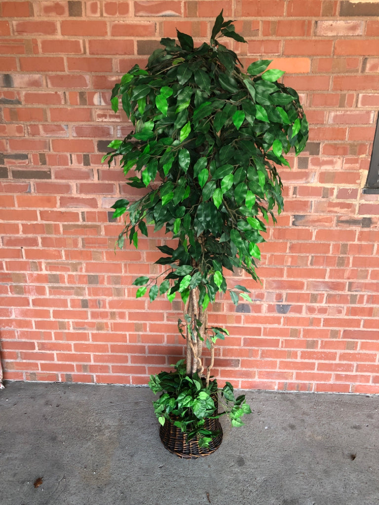 FAUX TREE IN WICKER PLANTER.