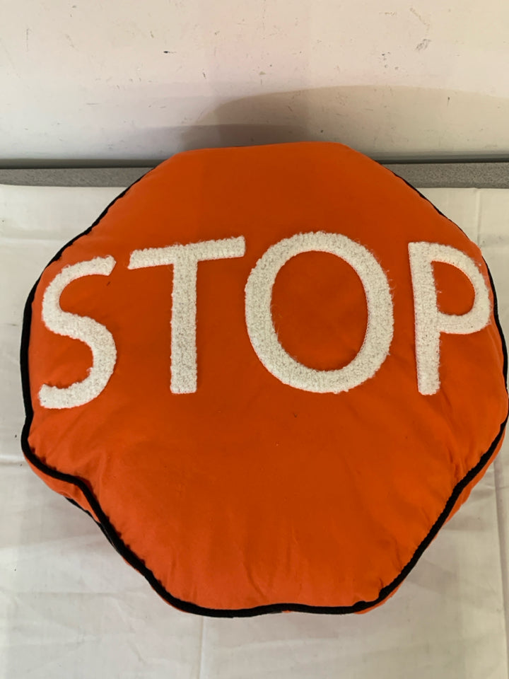 ORANGE STOP SIGN PILLOW.