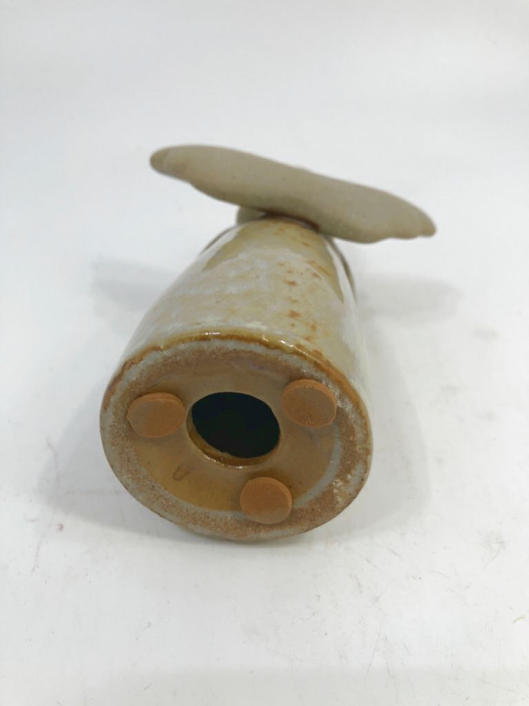 CERAMIC ANGEL WITH STAR FIGURINE.