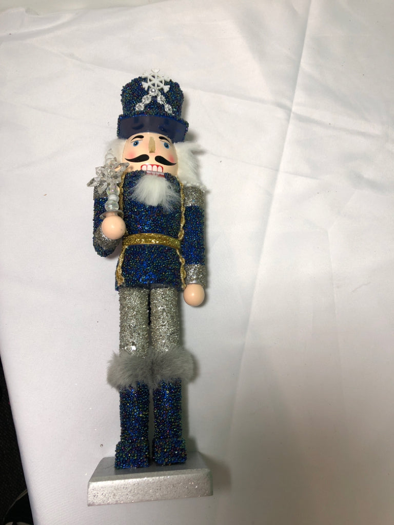 BLUE AND SILVER SNOWFLAKE NUT CRACKER.