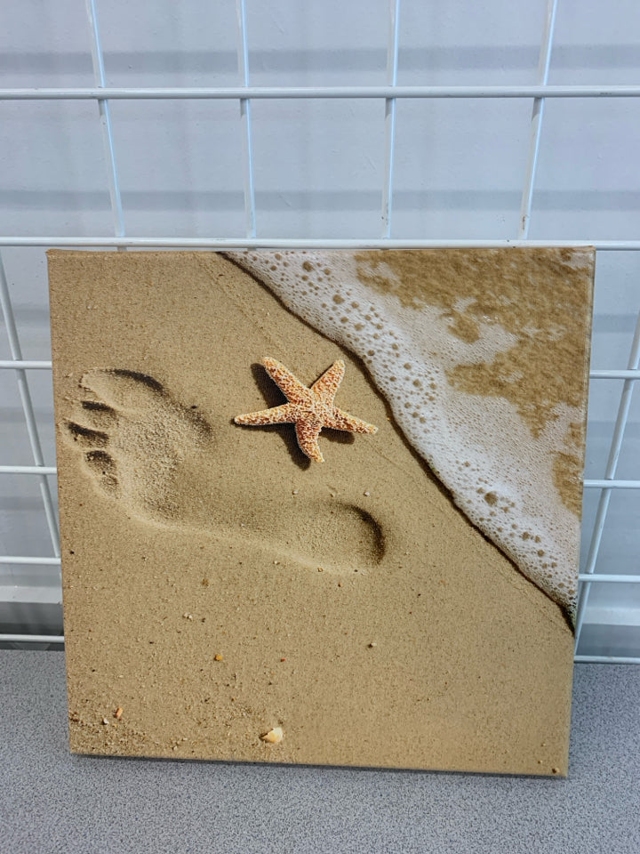 FOOTPRINT IN SAND CANVAS.