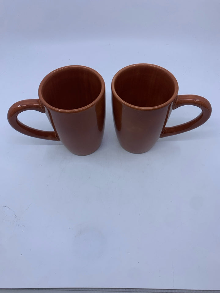 2 TAN MUGS.