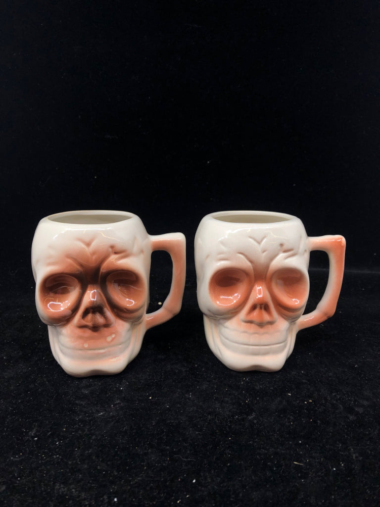 2 VTG SKULL MUGS.