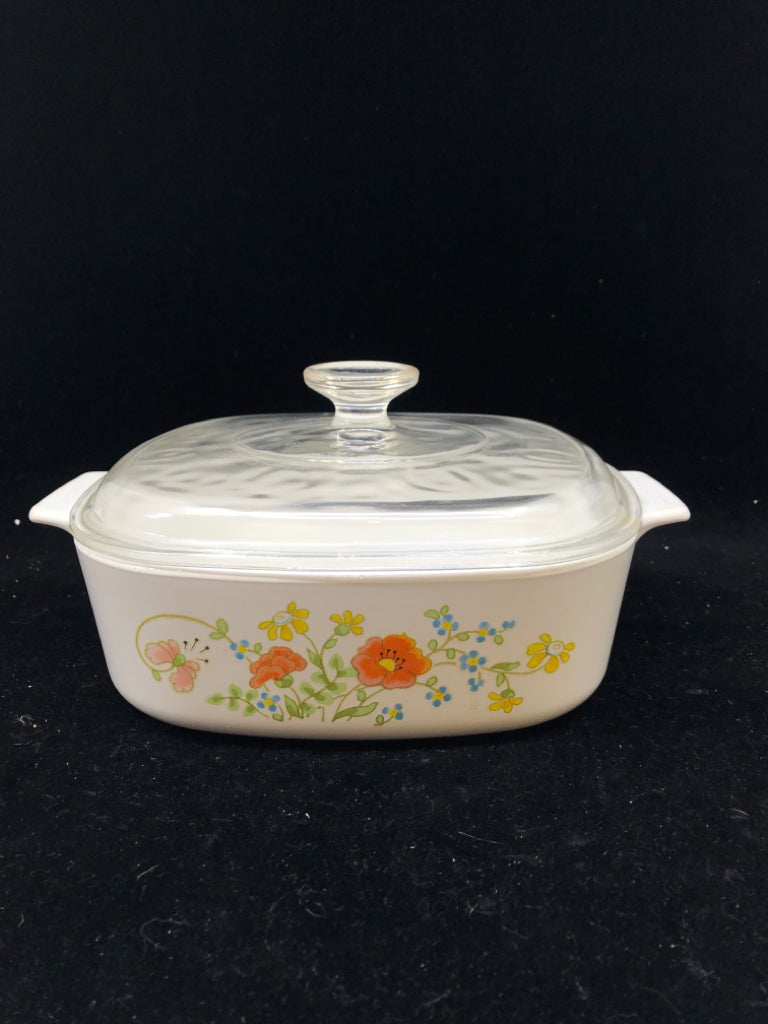 SQUARE FLORAL COVERED CASSEROLE DISH.