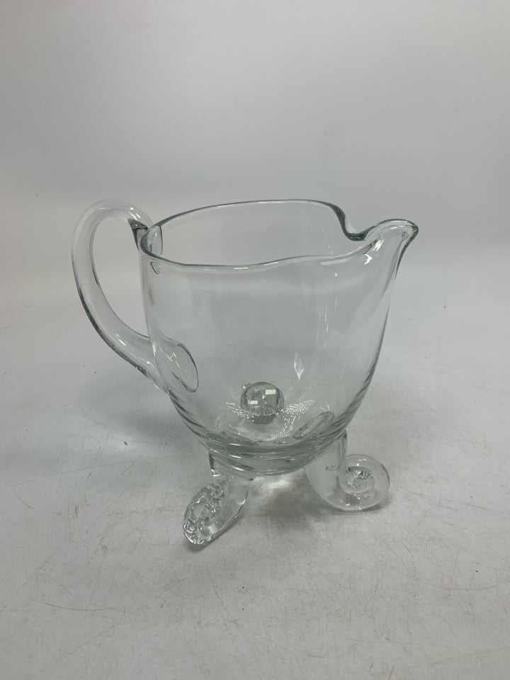 SWIRL FOOTED BLOWN GLASS PITCHER W/ ICE LIP.