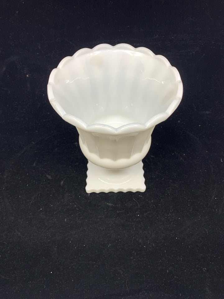 VTG FOOTED MILK GLASS VASE.