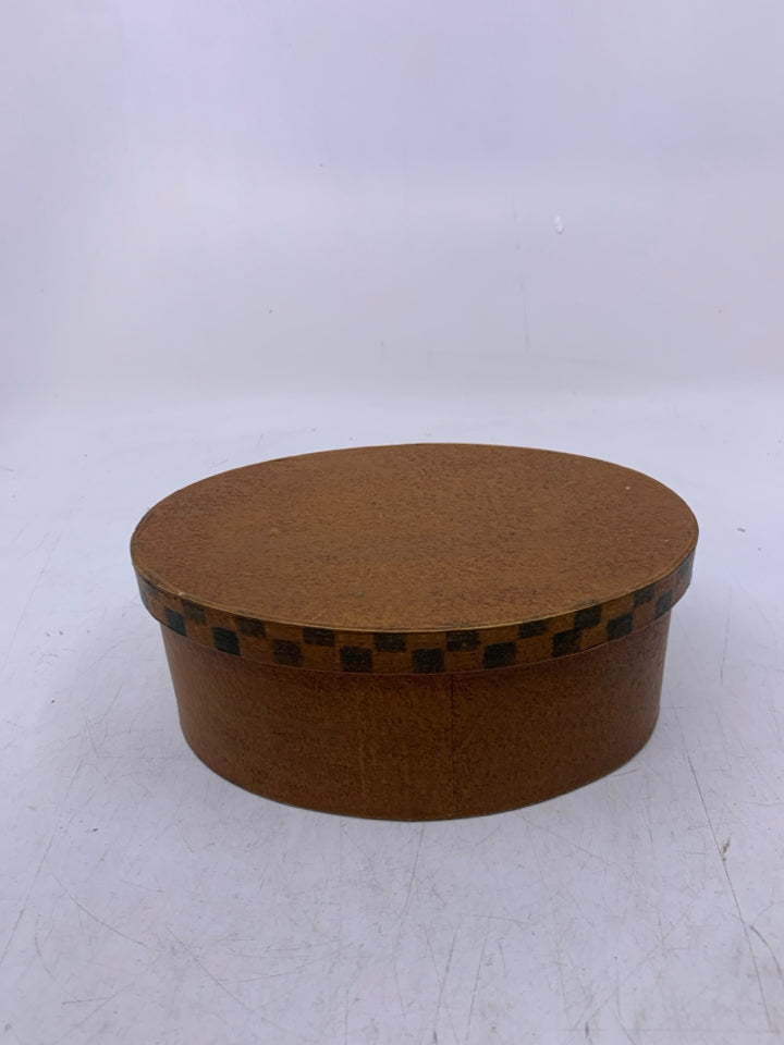 OVAL LIGHT BROWN DECORATIVE BOX W/ CHECKERED RIM.